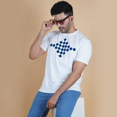 men wearing pure cotton lycra half sleeve round neck t shirt pearl white soft white color digital chest print breathable everyday wear premium comfort sitting on stool