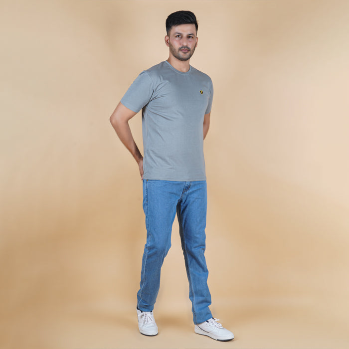 men wearing pure cotton half sleeve round neck t shirt charcoal grey dark grey color breathable everyday wear premium comfort paired with premium cotton stretch light blue EPG jeans