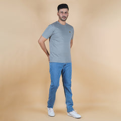 men wearing pure cotton half sleeve round neck t shirt charcoal grey dark grey color breathable everyday wear premium comfort paired with premium cotton stretch light blue EPG jeans