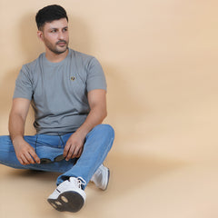 men sitting wearing pure cotton half sleeve round neck t shirt charcoal grey dark grey color breathable everyday wear premium comfort true size true fit