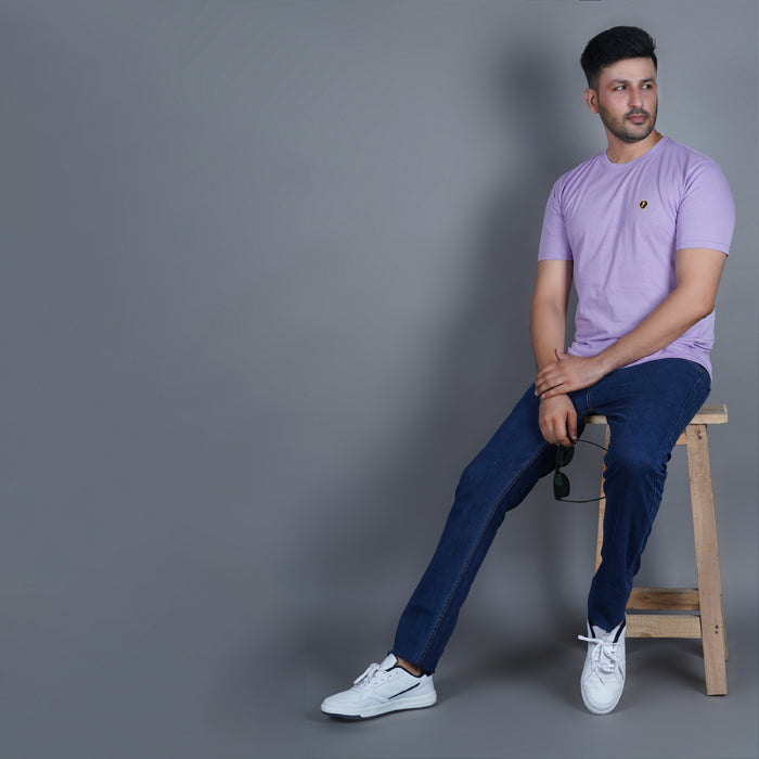 men wearing pure cotton half sleeve round neck t shirt lilac soft purple color breathable everyday wear premium comfort paired with premium cotton stretch EPG dark blue jeans
