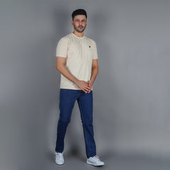 men wearing pure cotton half sleeve round neck t shirt california peach breathable everyday wear premium comfort paired with EPG comfort dark blue jeans