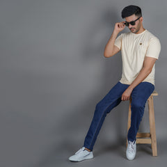 relaxed full front view of men wearing gold finish cotton peach color round neck t shirt no sag no bleed fabric