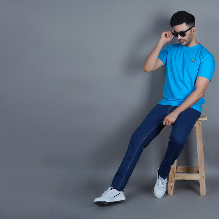 lifestyle shot of men wearing goldfinish aqua blue color round neck t shirt super soft true size fit