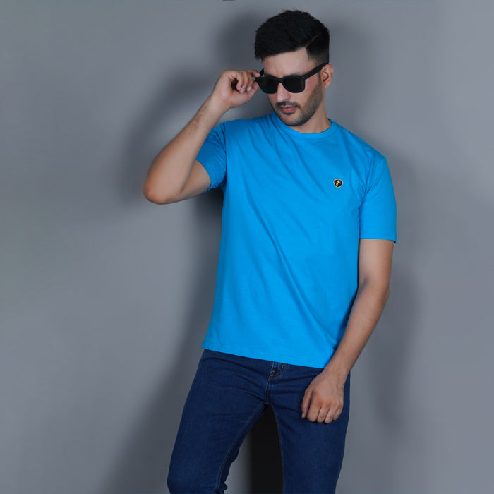 men wearing pure cotton lycra half sleeve round neck t shirt aqua blue breathable everyday wear premium comfort lifestyle shot with EPG jeans pain dark blue color pairing