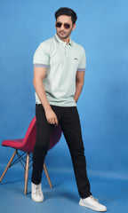 men wearing cotton lycra half sleeve polo t shirt pistachio soft green color standing front view breathable everyday wear premium comfort