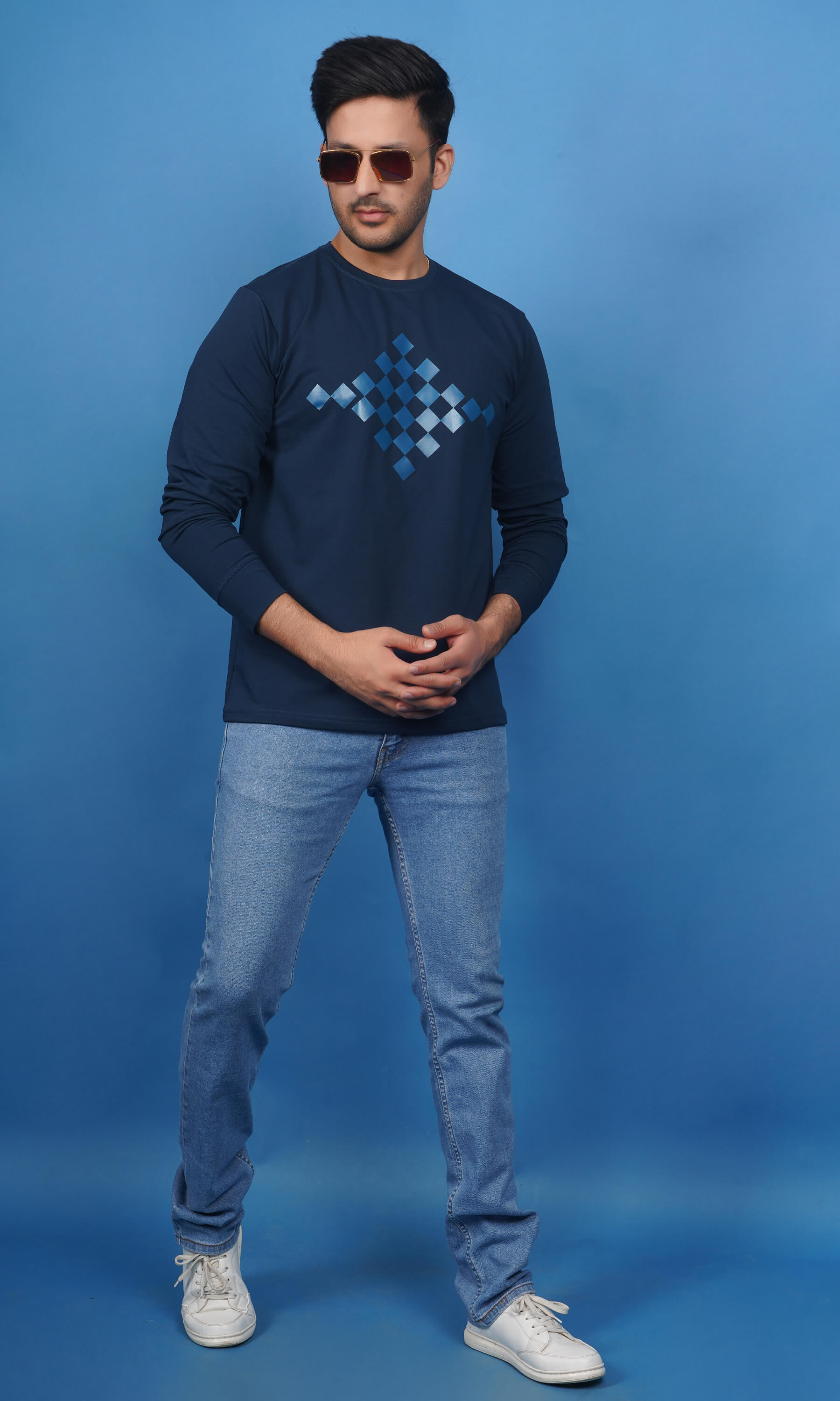 lifestyle shot men wearing cotton lycra french terry full sleeve sweatshirt denim blue warm comfortable everyday wear premium comfort paired with EPG light blue jeans