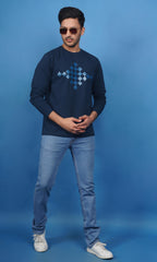 lifestyle shot men wearing cotton lycra french terry full sleeve sweatshirt denim blue warm comfortable everyday wear premium comfort paired with EPG light blue jeans